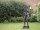 Figur aus Bronze stehender Junge beim Angeln